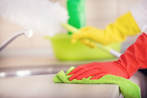 Cleaner restoring a lounge sofa during sofa cleaning in Eltham